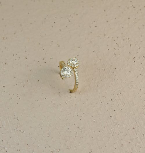 Gold Diamond Ring in Close-up Photography