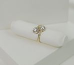 Gold Ring on White Paper