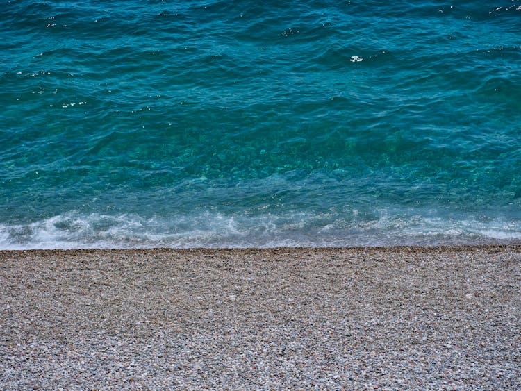 Blue Water On Seashore