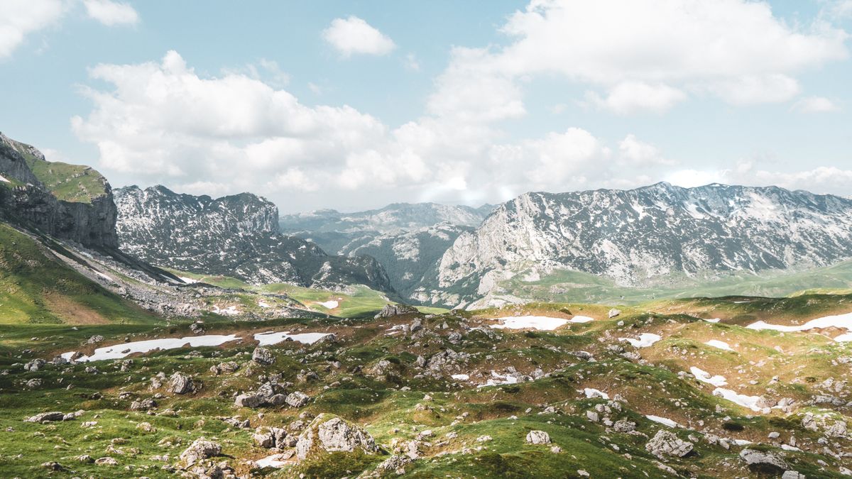Rocky peaks and green valleys in the Durmitor massif in summer