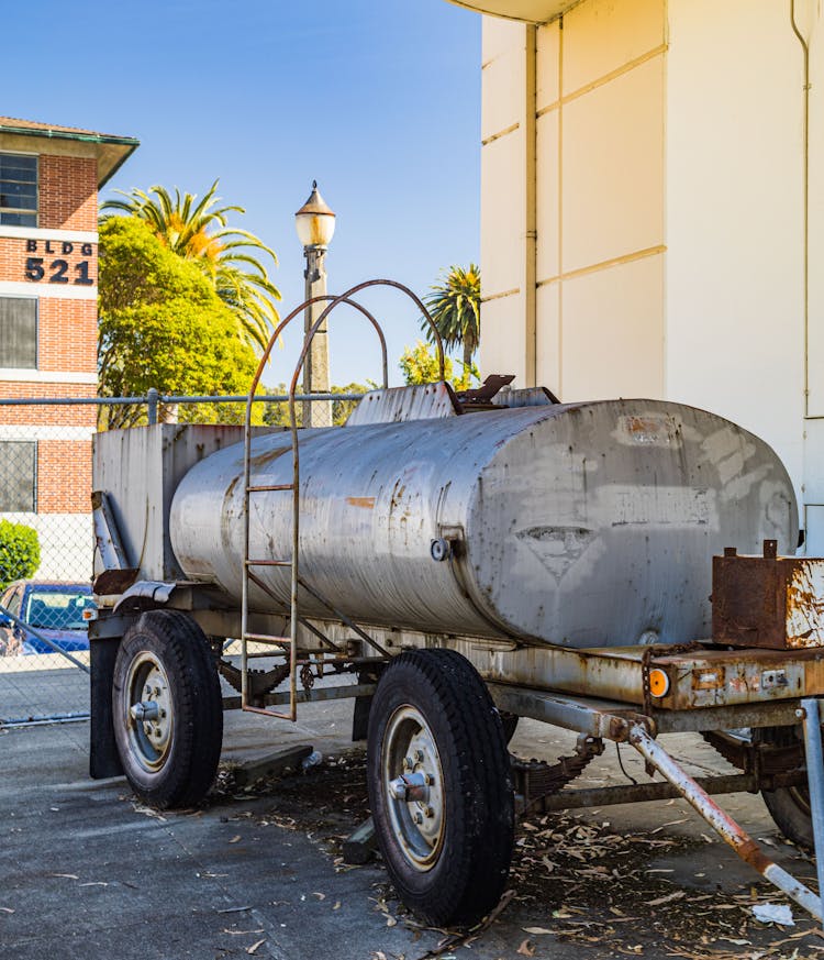 Rusty Steel Water Tank On Trailer