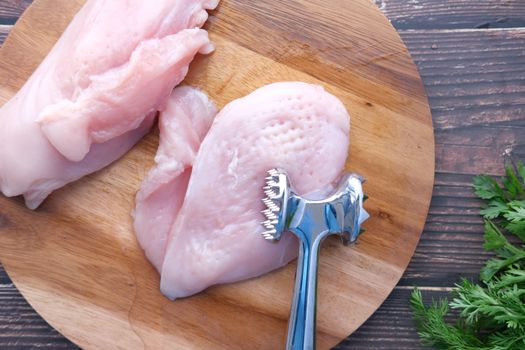 Raw Meat on Brown Wooden Chopping Board