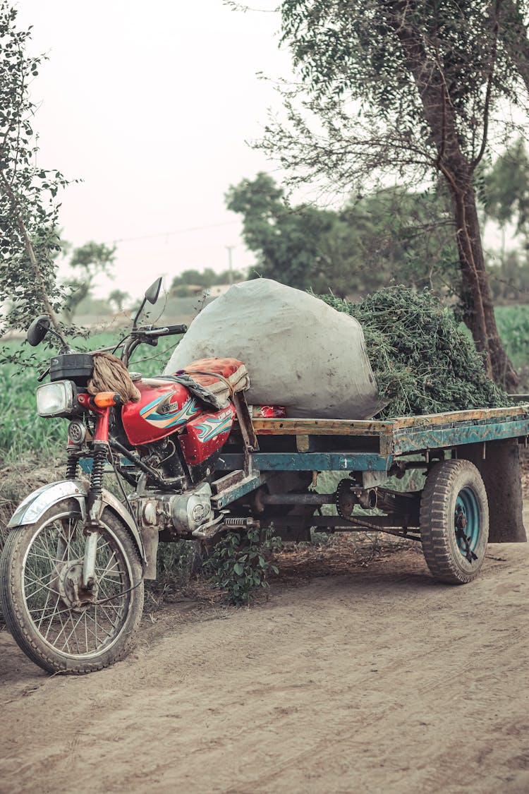 A Cart Pulled By A Motorcycle