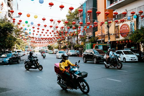 People and Vehicles on a Busy Road 