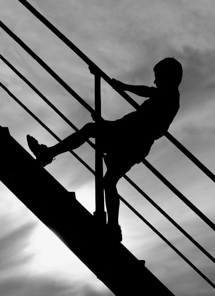 Boy Going Up A Stairs