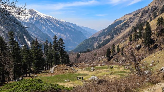 Explore the serene beauty of the Himalayan landscape with snow-capped peaks and lush valleys in the Sankari Range.