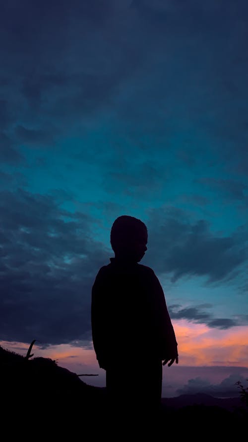 Silhouette of a Kid at Sunset