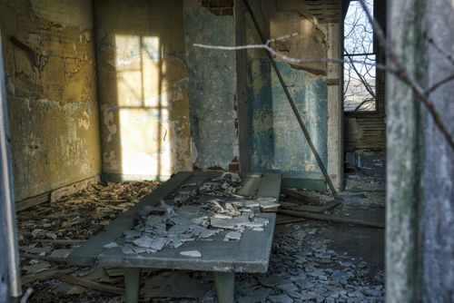 Free Explore the eerie beauty of a decaying room in a derelict house, captured in Minnesota. Stock Photo