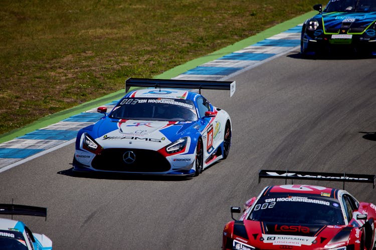 Cars Racing On A Race Track