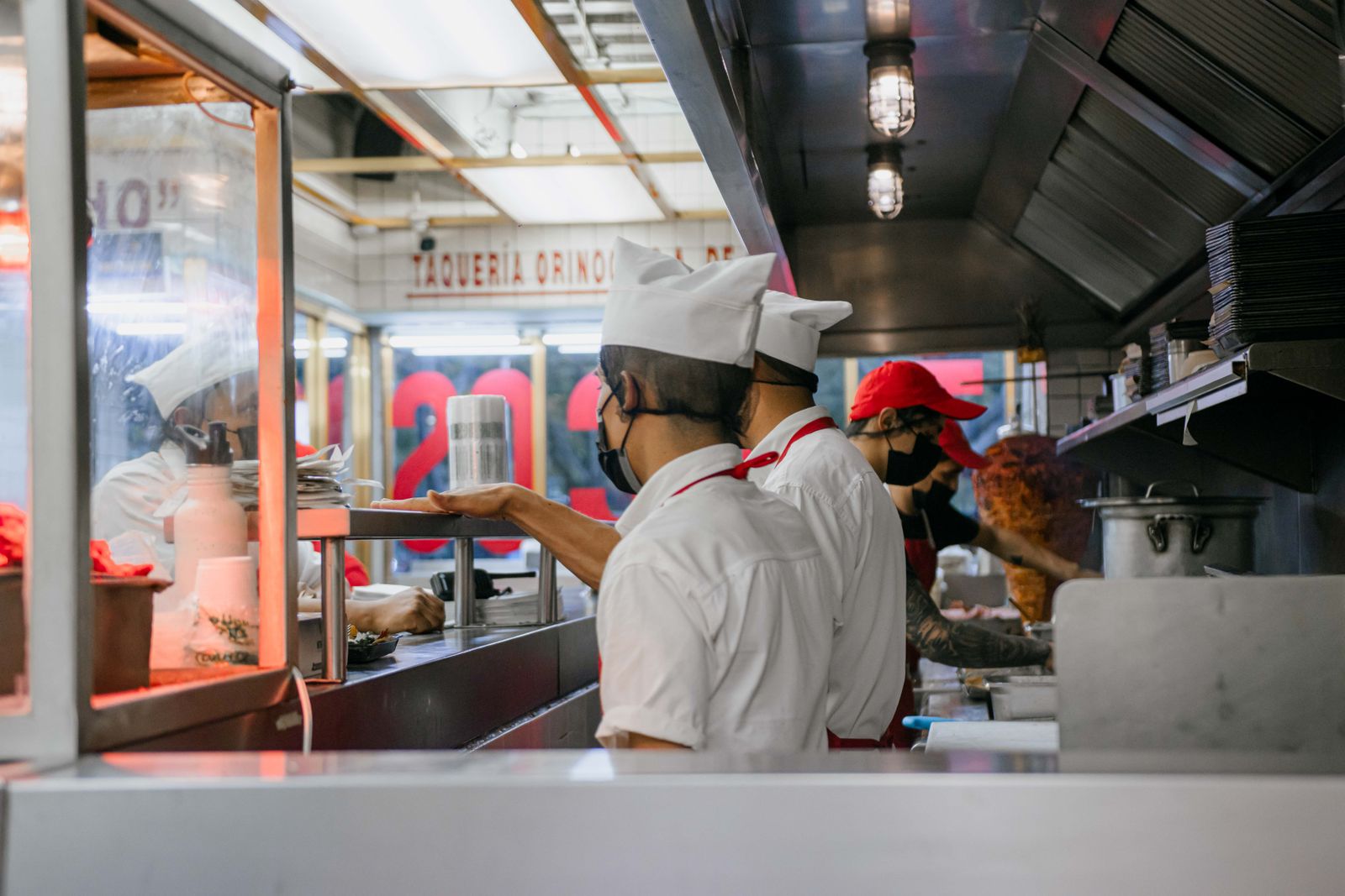 Restaurant kitchen staff working together