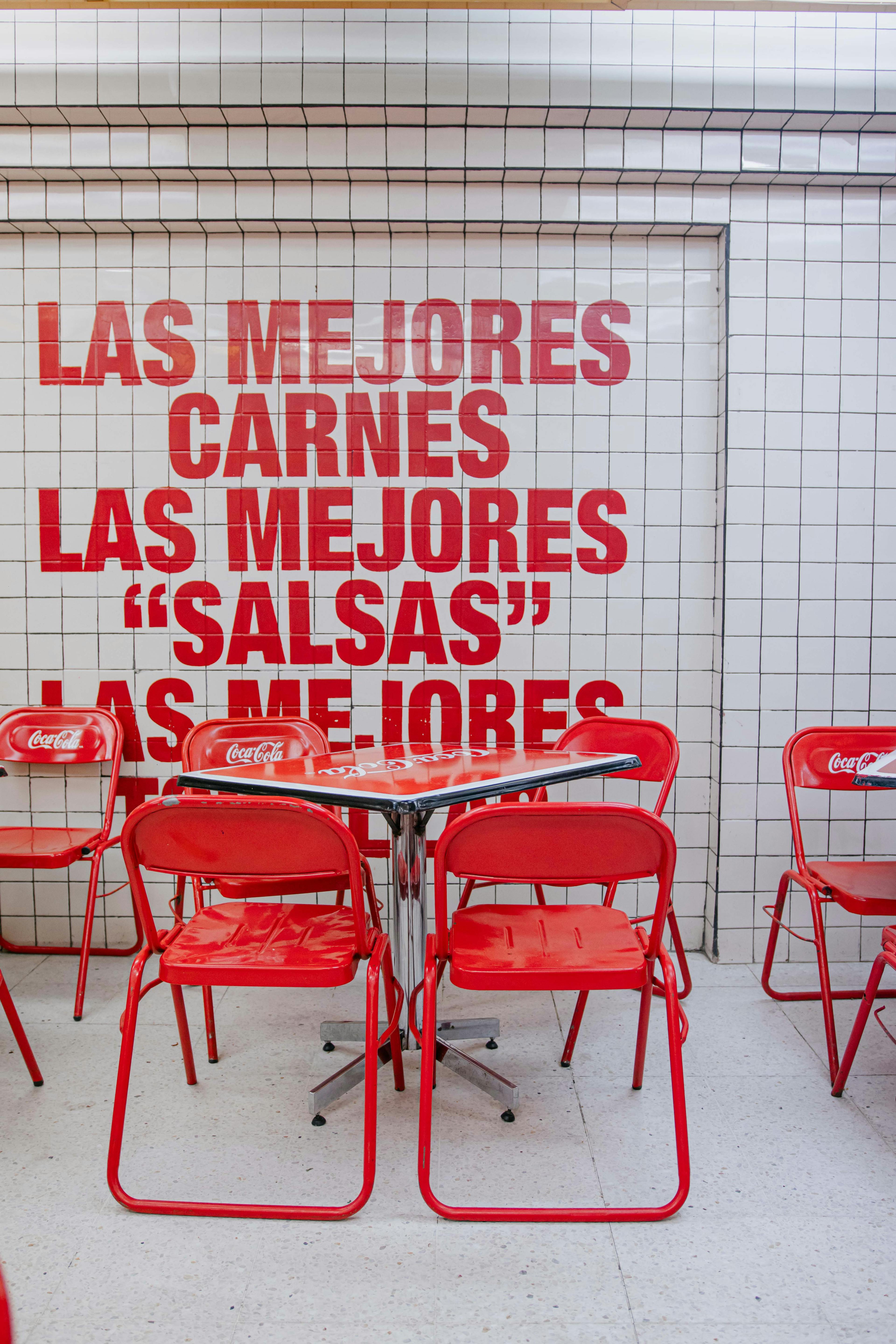 A bright restaurant interior using red and yellow tones to create an exciting dining atmosphere