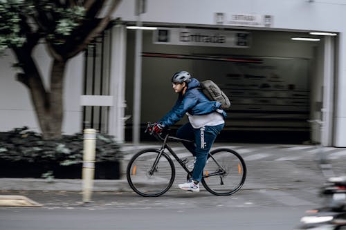 A Man Riding a Bicycle 