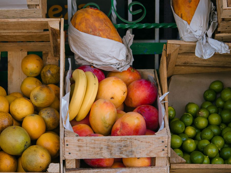 Fresh fruit in wooden market crates