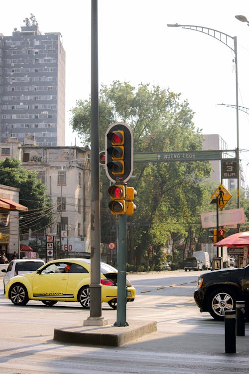 Yellow Car Crossing the Street