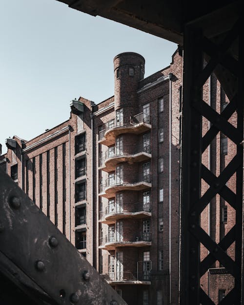 Brown Brick Building with Balconies
