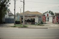 Quaint second-hand store with rustic charm on a quiet street. Perfect for urban exploration themes.