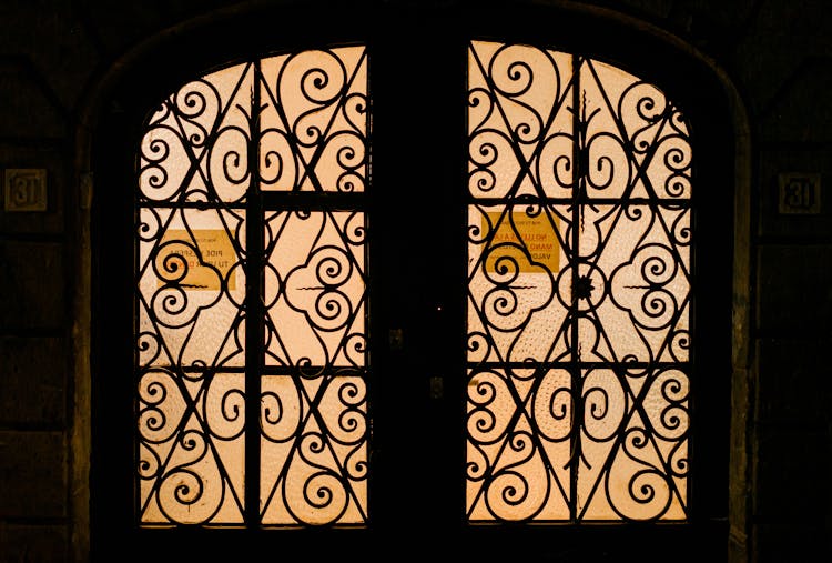 Intricate Metal Frame On A Glass Window