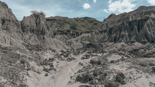 Free Explore the stunning rock formations and eroded terrain of Colombia's arid wilderness. Stock Photo