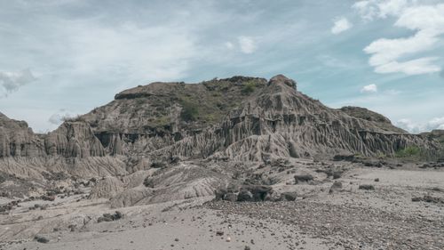 Free Explore the unique rock formations and erosion patterns in this barren Colombian landscape. Stock Photo