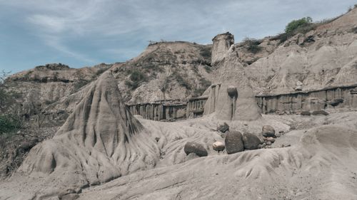 Free Explore a barren wilderness showcasing dramatic geological rock formations under clear blue skies. Stock Photo