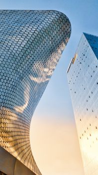 Captivating perspective of Museo Soumaya with modern architecture in Mexico City under clear skies.
