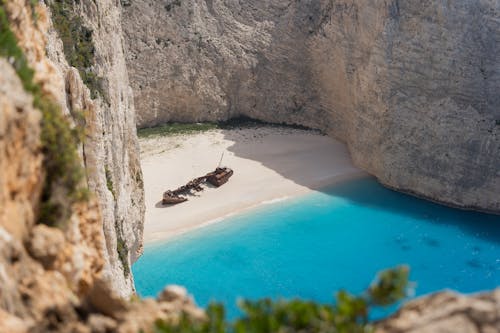 Shipwreck on a Beach Sand in Tilt-shift Lens 