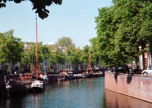 Бесплатное стоковое фото с вода, здания, лодки