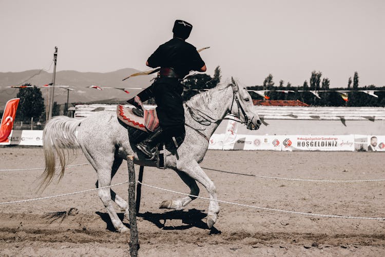 Rider In Costume Riding On A Horse