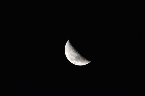 Free Beautiful crescent moon captured in clear night sky over Lima, Peru. Stock Photo