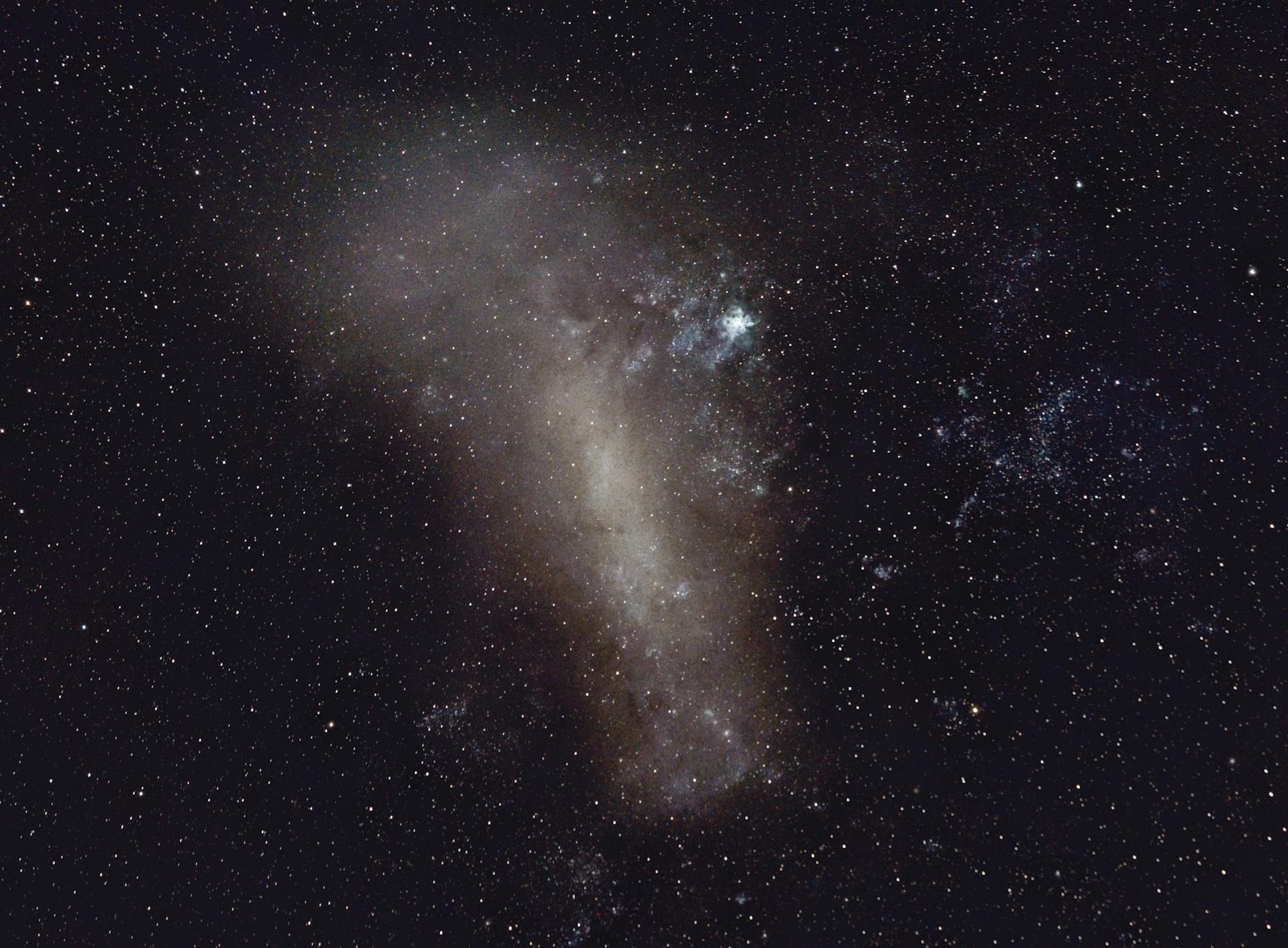 Capture of the Large Magellanic Cloud amidst a starry night sky.