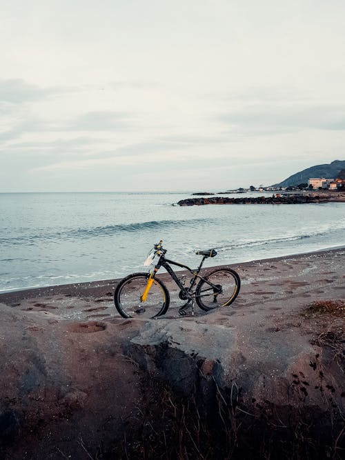 mountain Bike Parked on Seashore