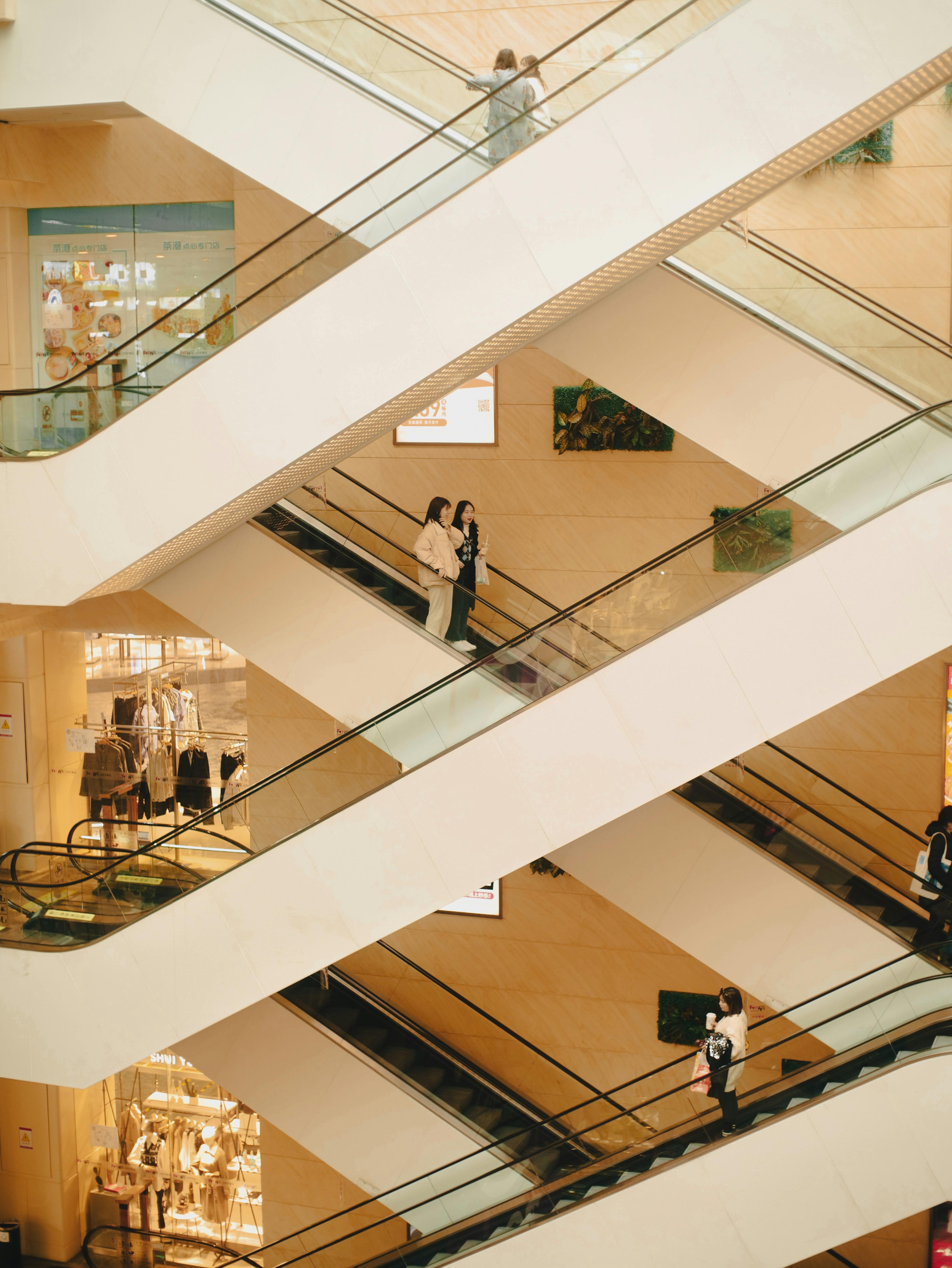 photo of people on the escalators