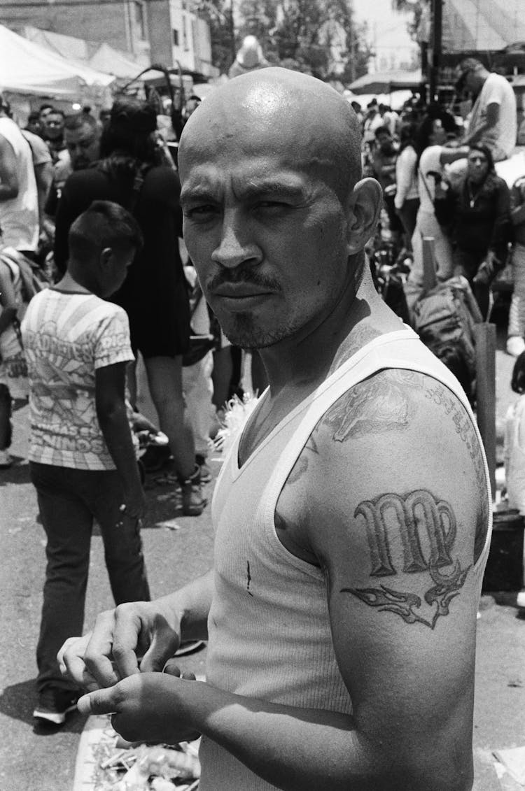 Close-up Photo Of Man With Tattooed Arm