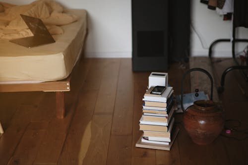 Free books on a wood floor Stock Photo