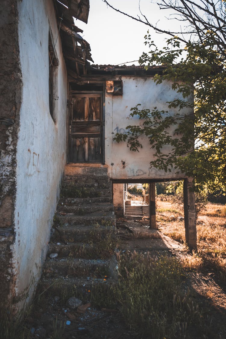 Brown Wooden Door Of A Shabby House 