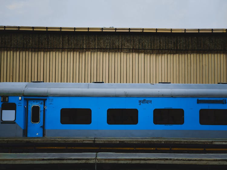 Blue Train On A Train Station