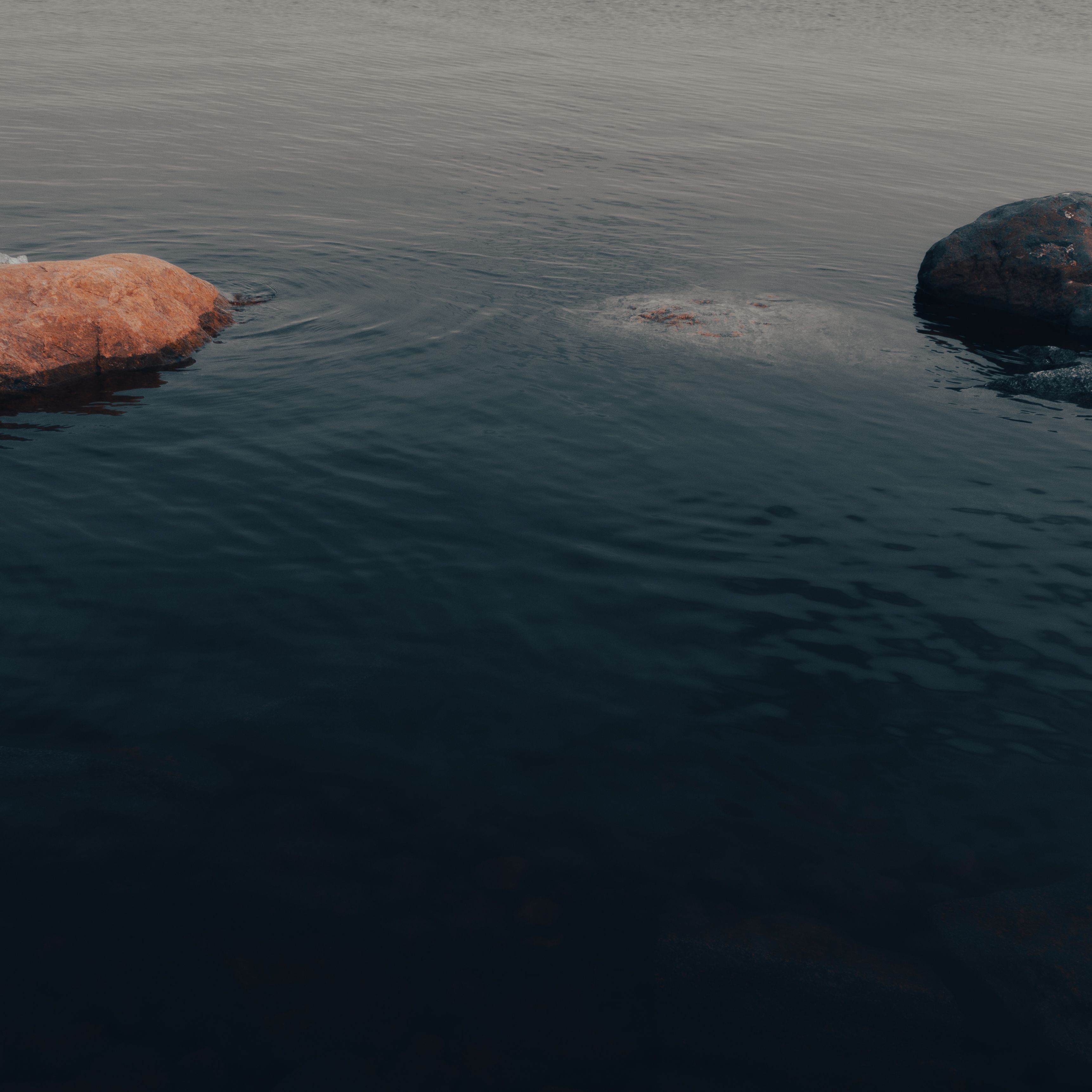 Brown Rock Formation on Body of Water · Free Stock Photo