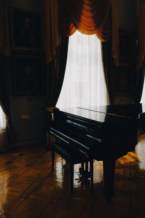 Vintage Piano near Windows