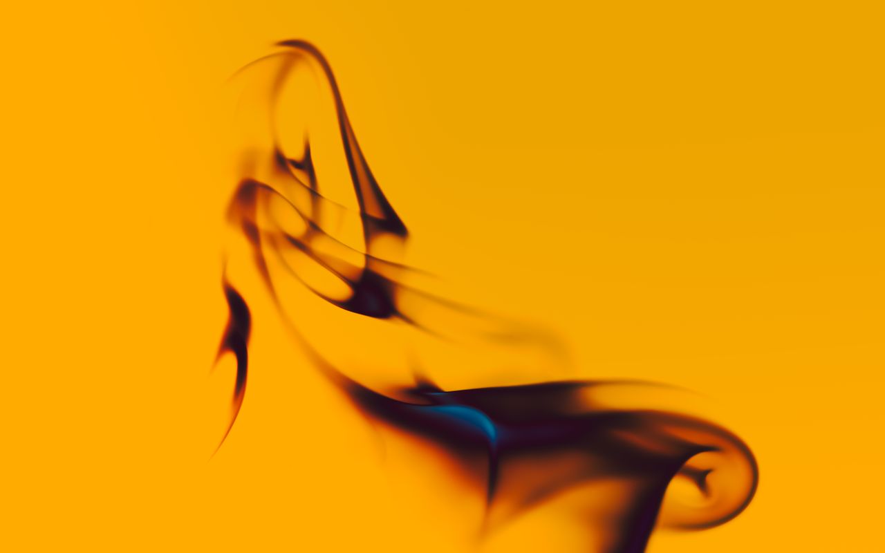 creative abstract smoke art with black swirls on a vibrant yellow back