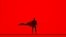Man in Red Long Sleeve Shirt and Black Pants