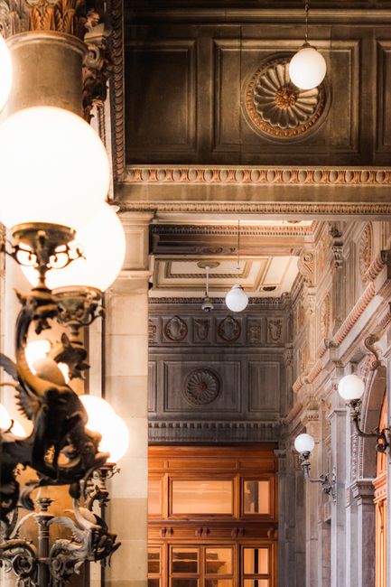 Ornate architectural details and opulent lighting in a historic Mexico City location.