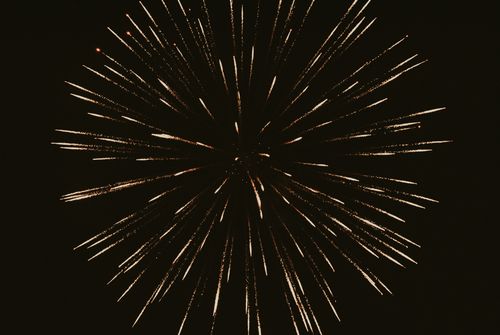 Free Vibrant fireworks burst across the night sky, capturing a dazzling celebratory moment. Stock Photo