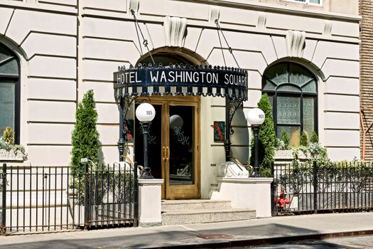 Elegant entrance of Hotel Washington Square, capturing classic New York architectural charm.