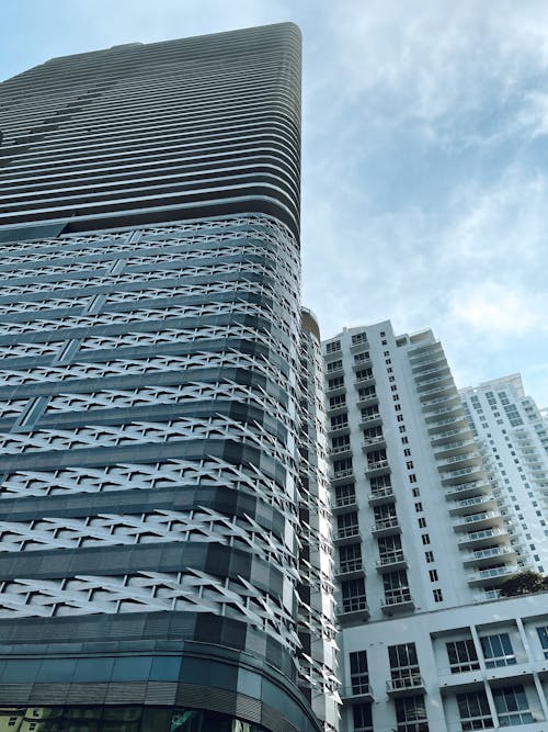 Low Angle Shot of High Rise Buildings under Blue Sky