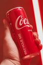 Coca Cola Can on Persons Hand