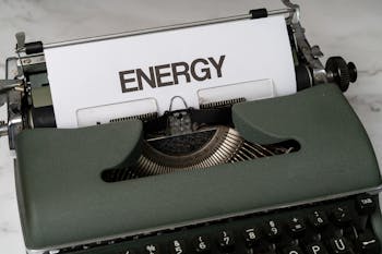 Green and White Typewriter on Green Table