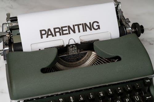 The Word Parenting on a Mechanical Typewriter