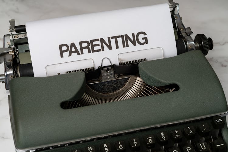 The Word Parenting On A Mechanical Typewriter