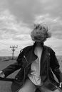 Grayscale Photo of Man in Black Jacket