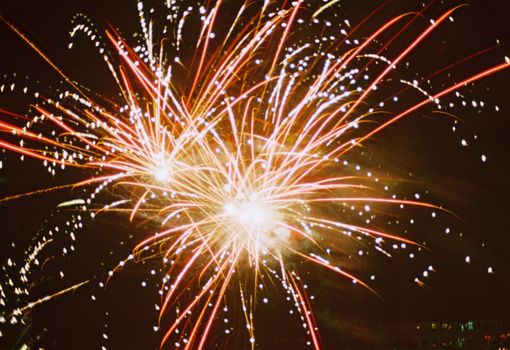 Stunning fireworks display illuminating the night with vivid colors and sparkling patterns.